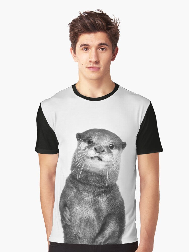 Graphic tee with a cute black and white otter portrait in a nature setting - Men