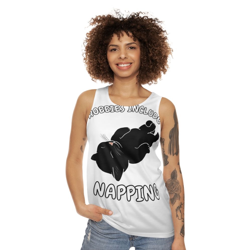 Unisex tank top with a black cat napping graphic - women