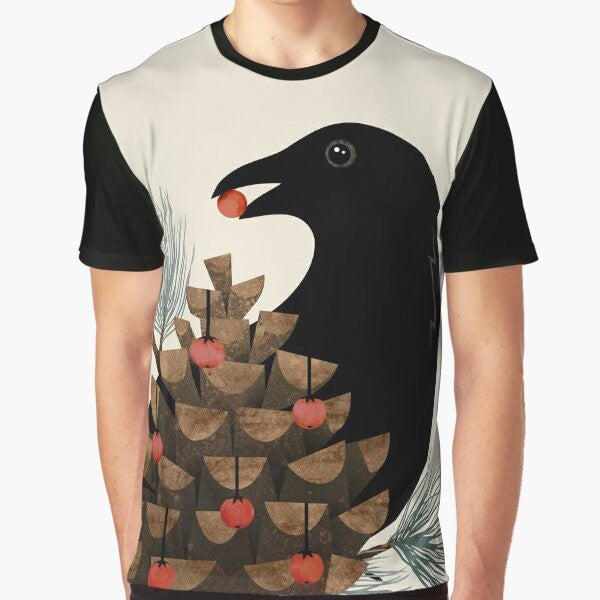 Elegant watercolor graphic t-shirt featuring a bird silhouette design with pine branches and berries, perfect for winter and nature lovers.