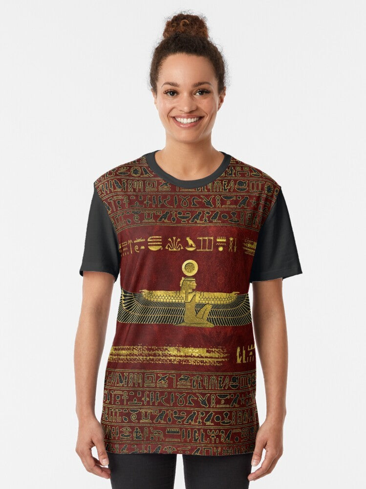 Graphic t-shirt featuring a gold Egyptian god ornament on a red leather background - Women