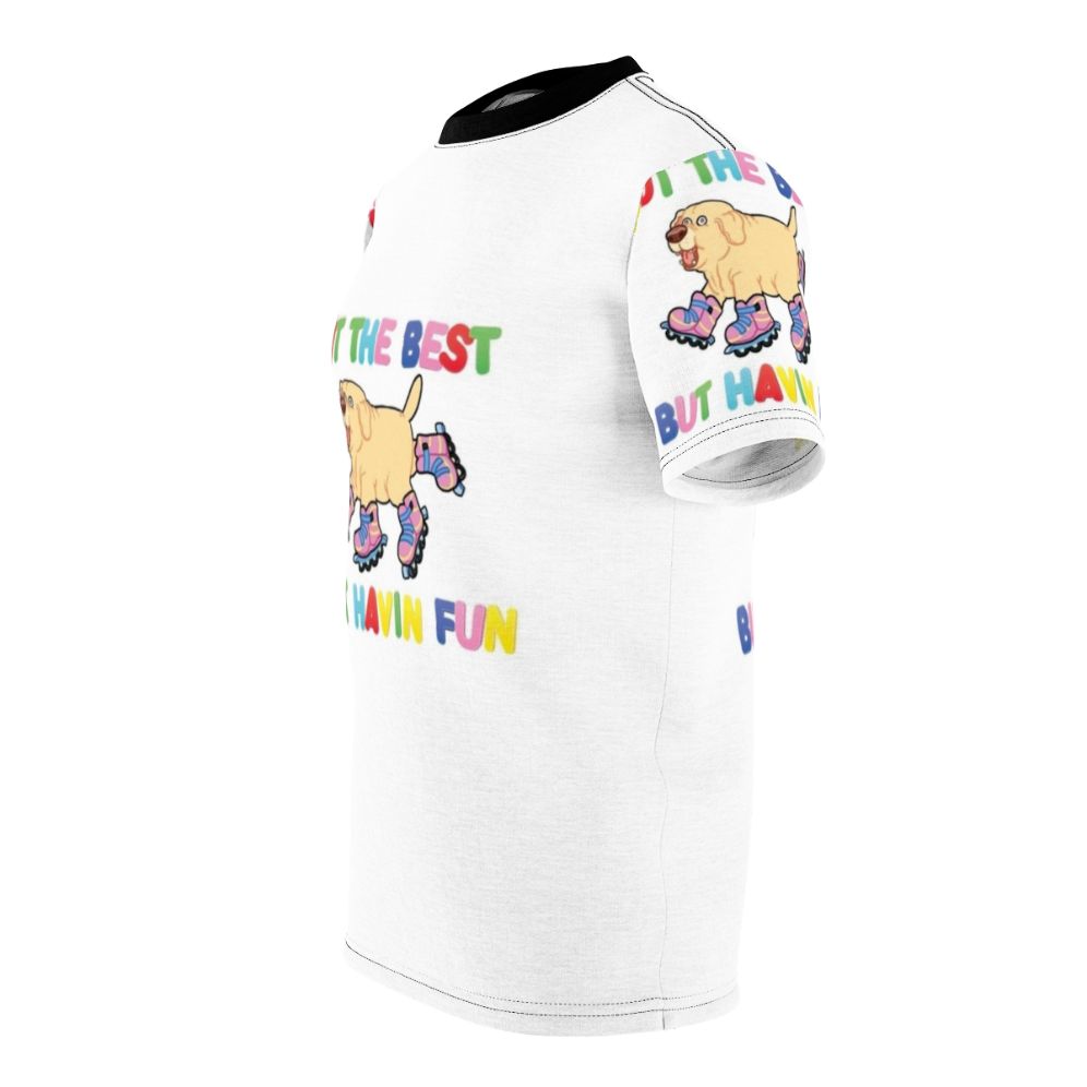 An AOP (all-over print) t-shirt featuring a playful dog on rollerskates or rollerblades, with the text "Not the best, but having fun". - men left