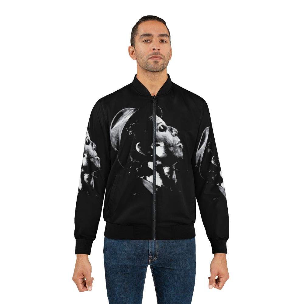 A bomber jacket featuring the image of Tom Waits, a renowned American singer-songwriter. - Lifestyle