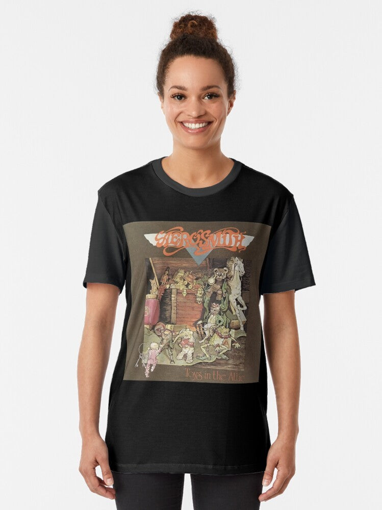 Graphic t-shirt with an image of toys in a scary room - Women