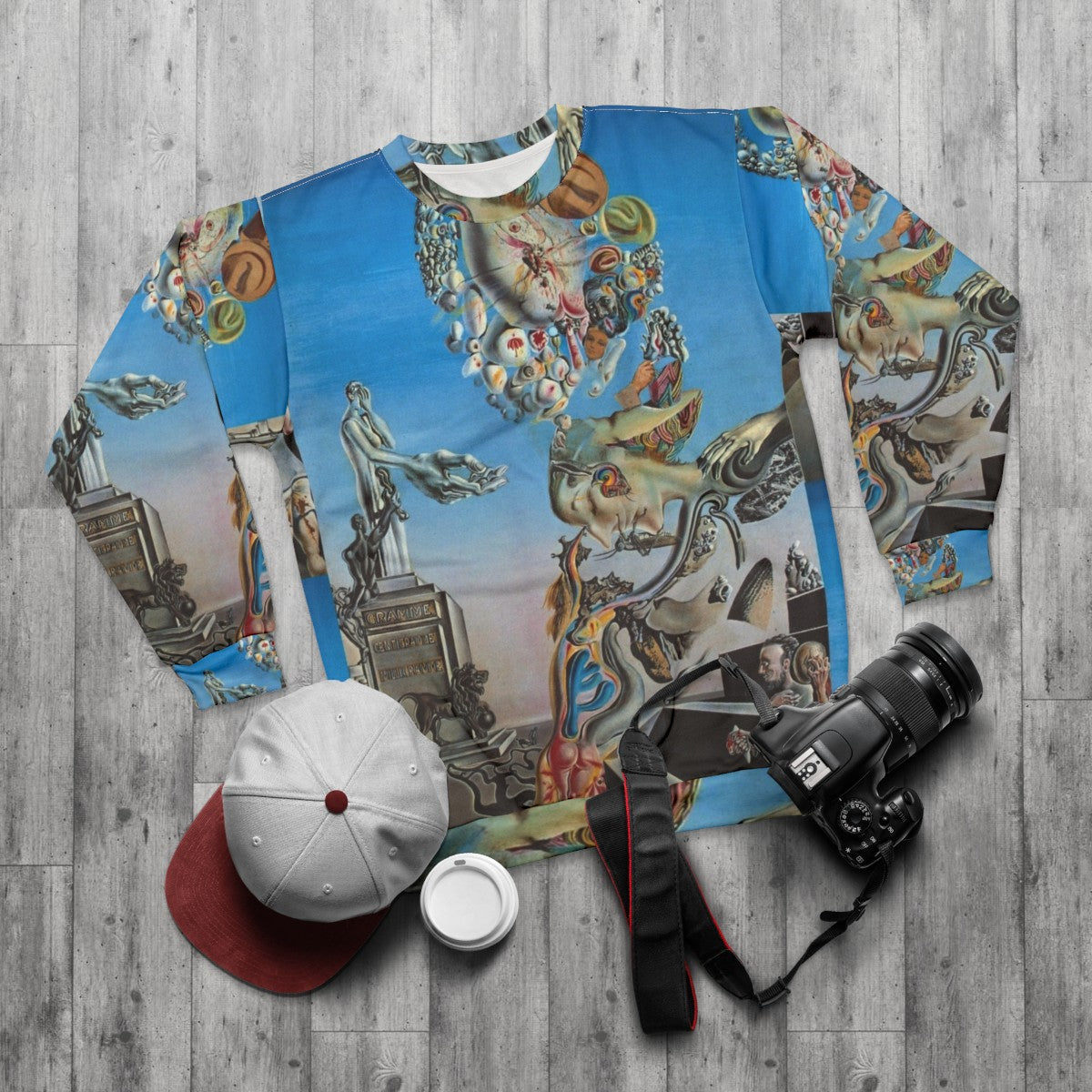 Surreal Salvador Dali-inspired desert dreamscape sweatshirt - flat lay