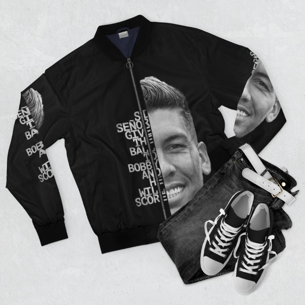 Roberto Firmino wearing a "Si Señor" bomber jacket with Liverpool FC crest and colors - Flat lay