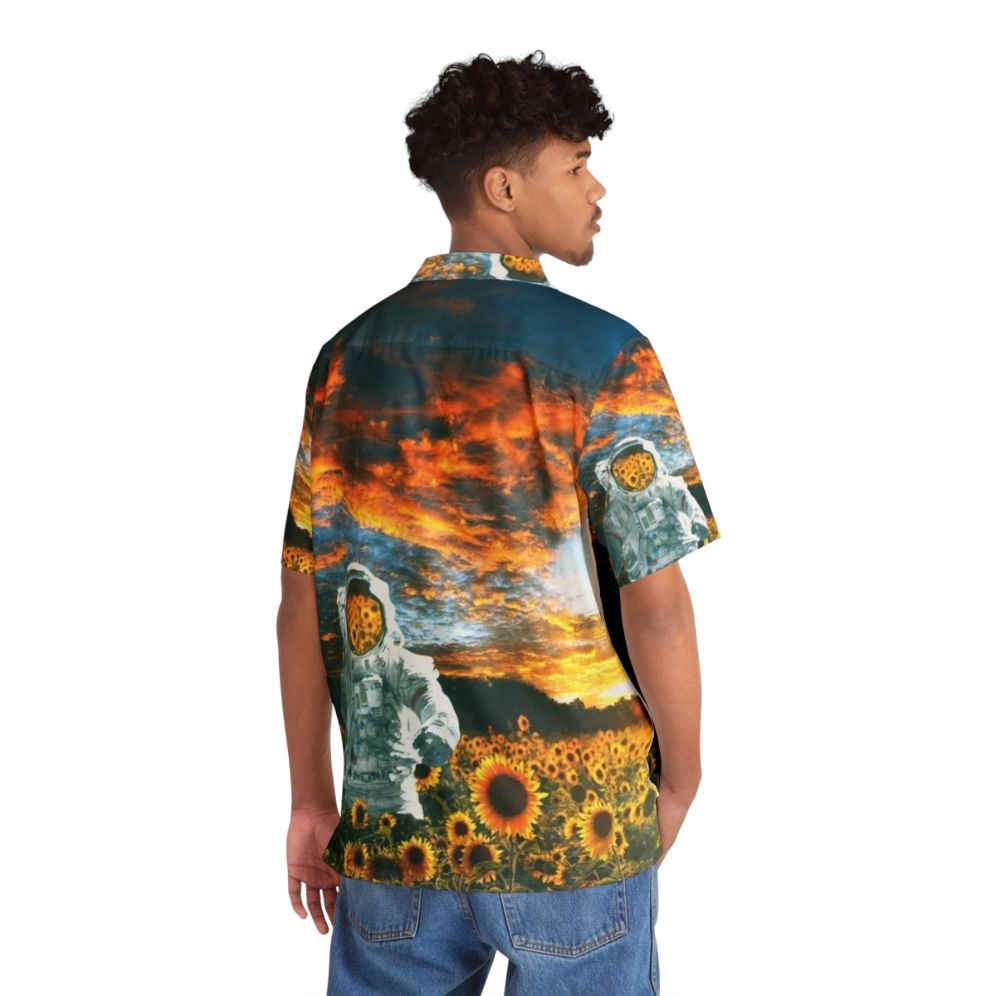 Astronaut in a galaxy Hawaiian shirt with sunflowers and a spaceship - People Back