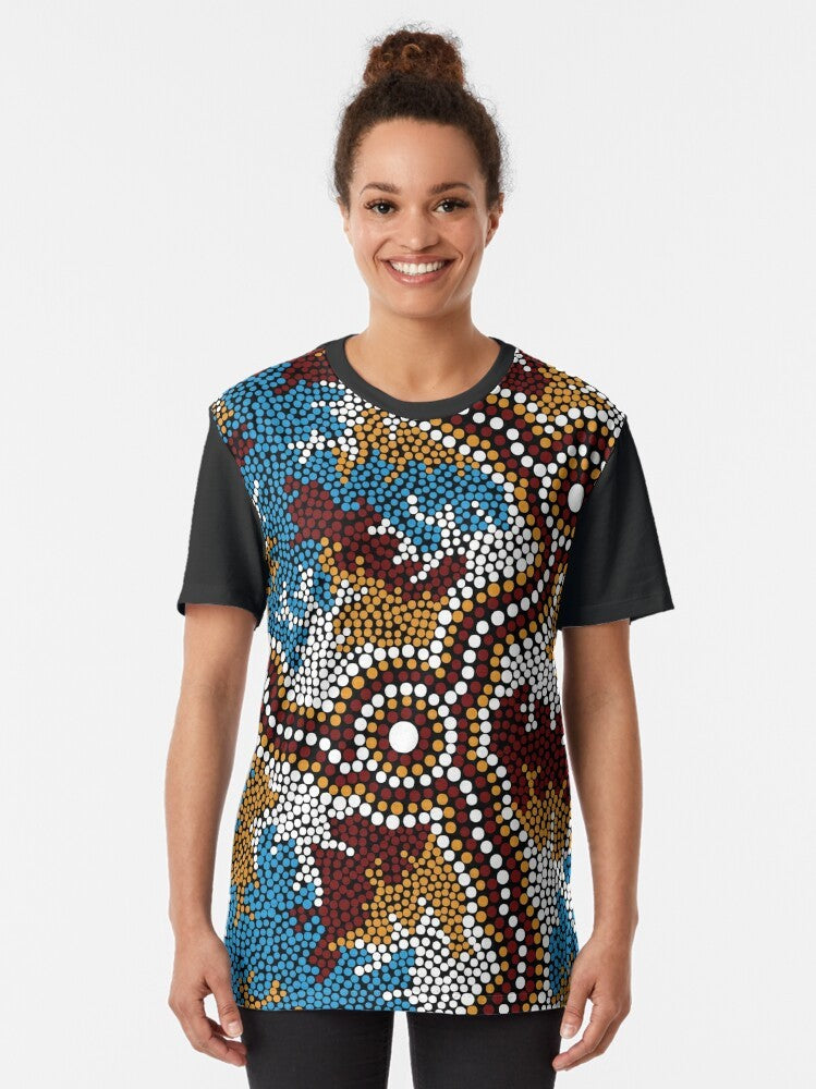 Authentic Aboriginal art graphic t-shirt featuring the Wetland Dreaming design - Women