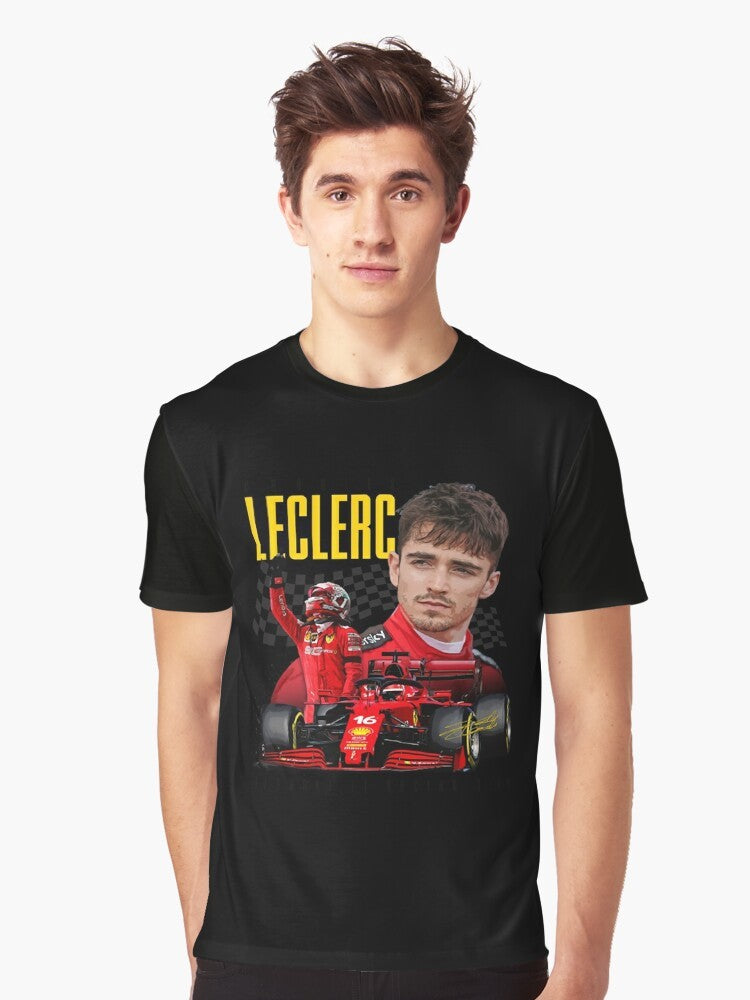 Charles Leclerc, Ferrari Formula 1 driver, wearing a graphic t-shirt with a Formula 1 design. - Men