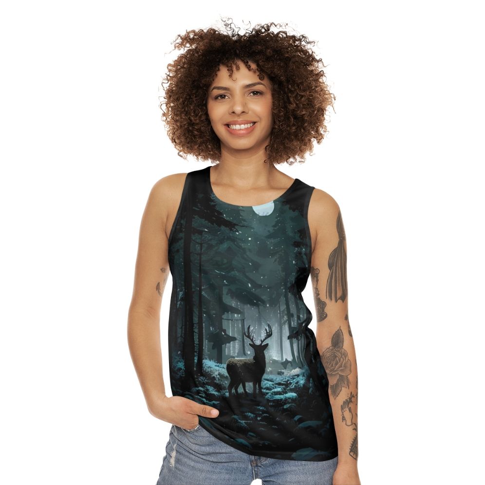 Unisex tank top featuring a winter woods landscape with a deer and the moon - women