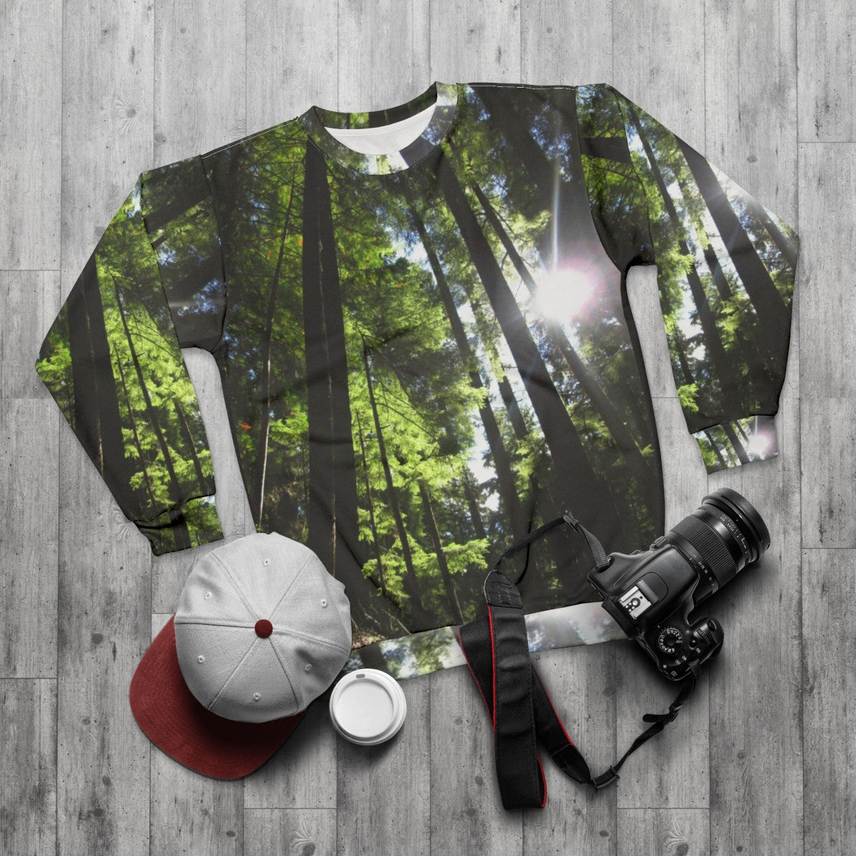 Sunlit fir trees sweatshirt for outdoor activities - flat lay