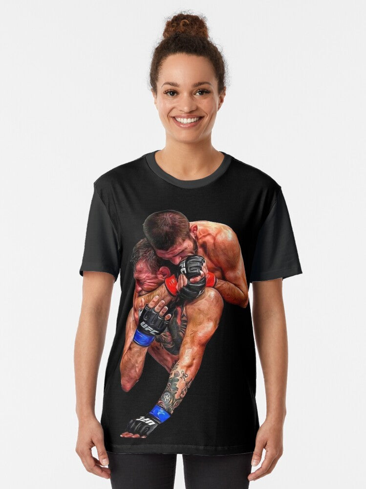 Graphic t-shirt featuring Khabib Nurmagomedov submitting Conor McGregor with a neck crank in their UFC 229 fight. - Women