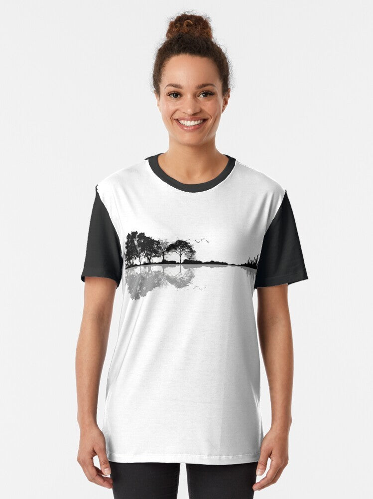 Minimalist nature guitar t-shirt design with silhouette trees, mountains, and birds in black and white - Women