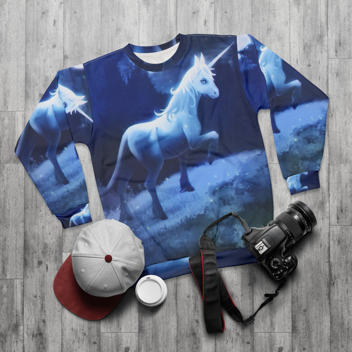 The Last Unicorn graphic sweatshirt featuring a mythical unicorn - flat lay