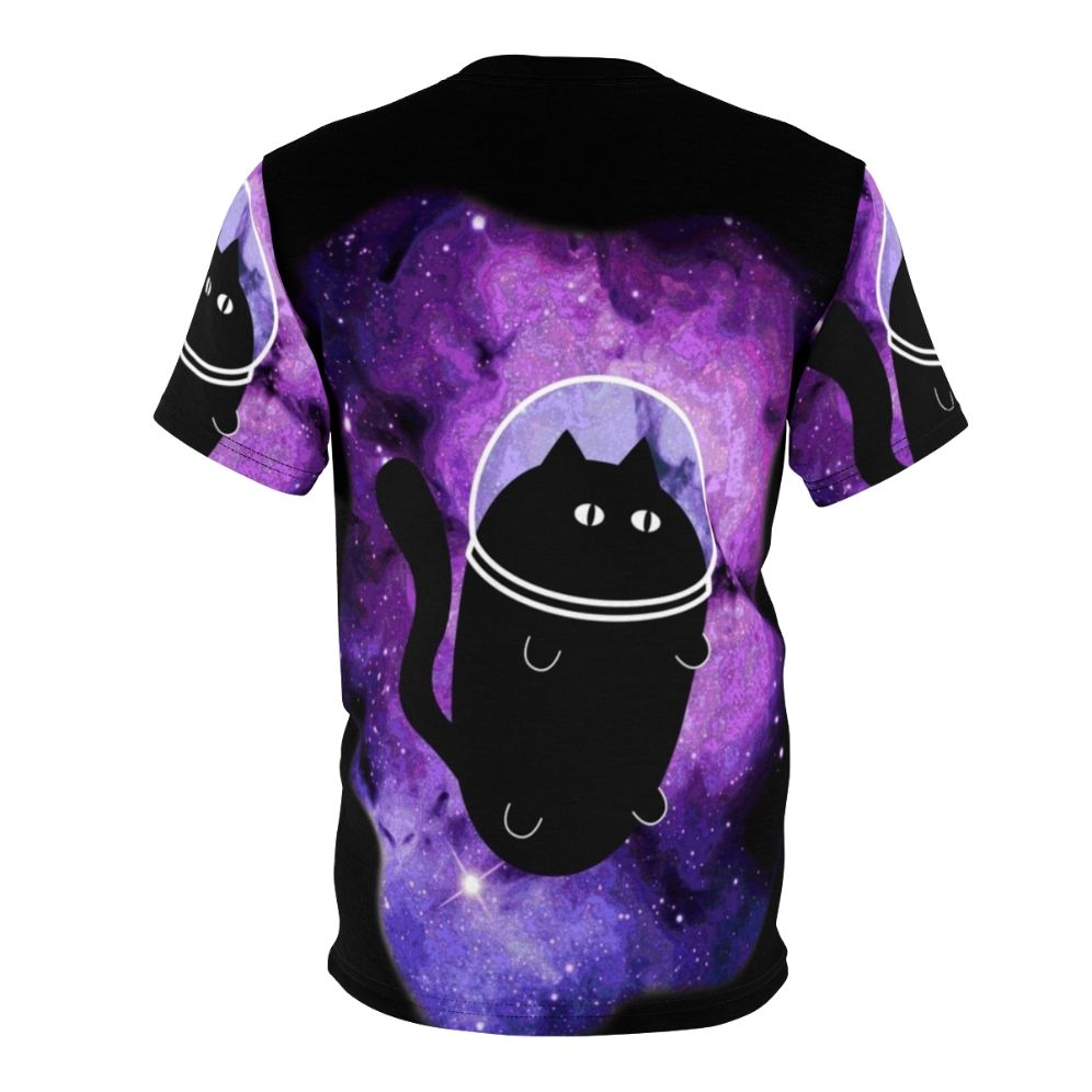 A cat astronaut floating in a galaxy of stars, planets, and nebulae on an all-over print t-shirt - Back