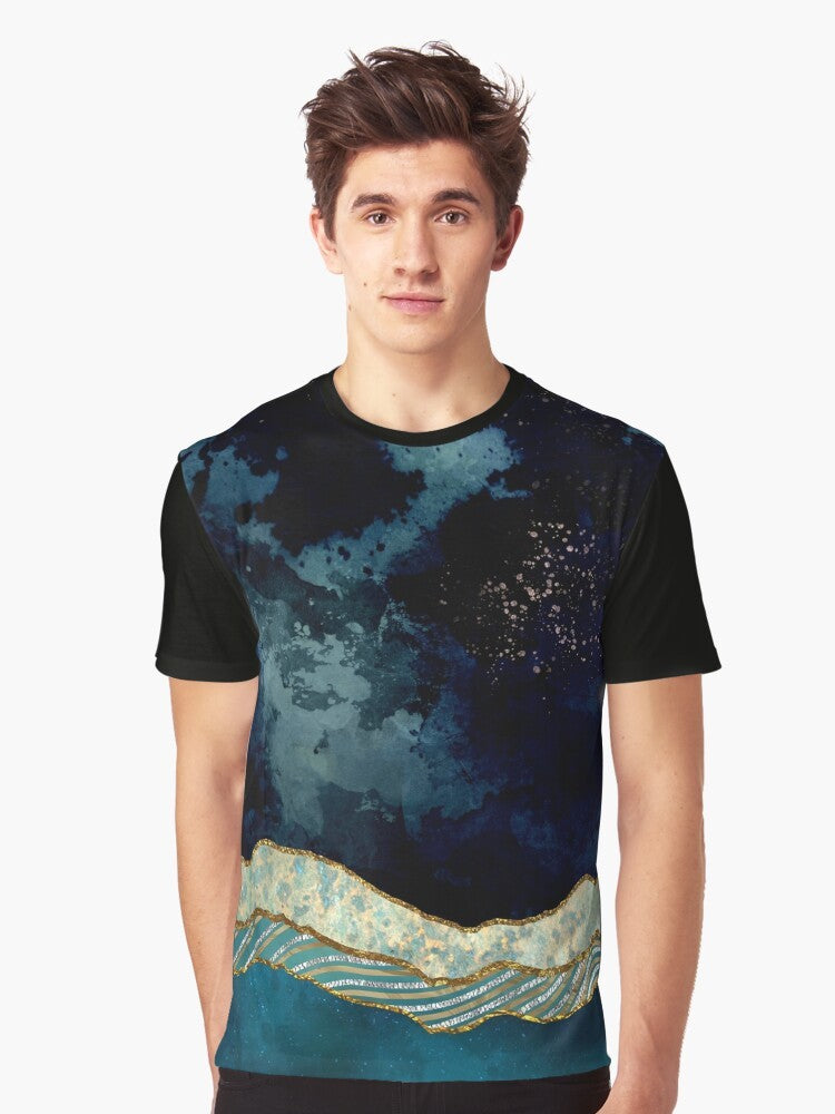 Indigo sky graphic t-shirt featuring a nature landscape design with mountains, stars, and a moon reflection on a lake. - Men