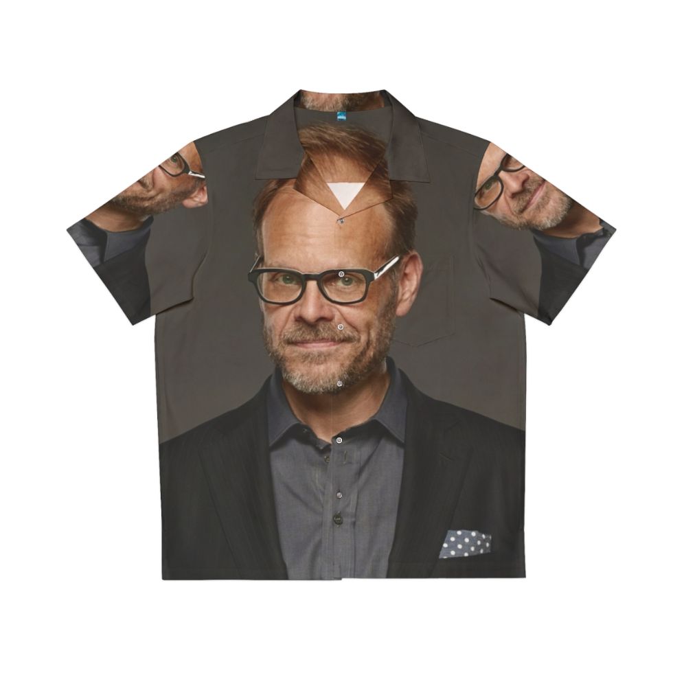 Alton Brown wearing a colorful Hawaiian shirt with a cooking theme