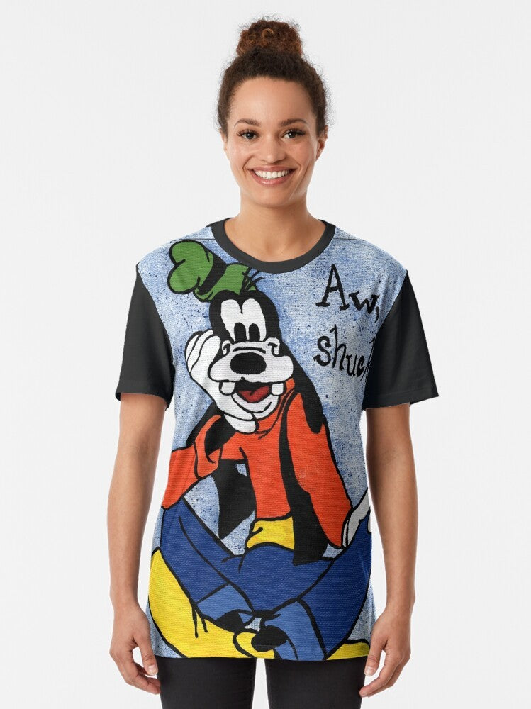 Goofy painting graphic t-shirt with a cartoon dog on a blue and speckle background - Women