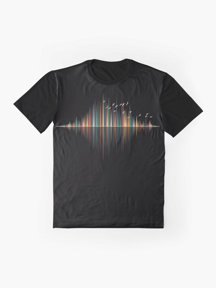 A minimalist graphic t-shirt design featuring a colorful sound wave silhouette with birds flying against a sunset background. - Flat lay