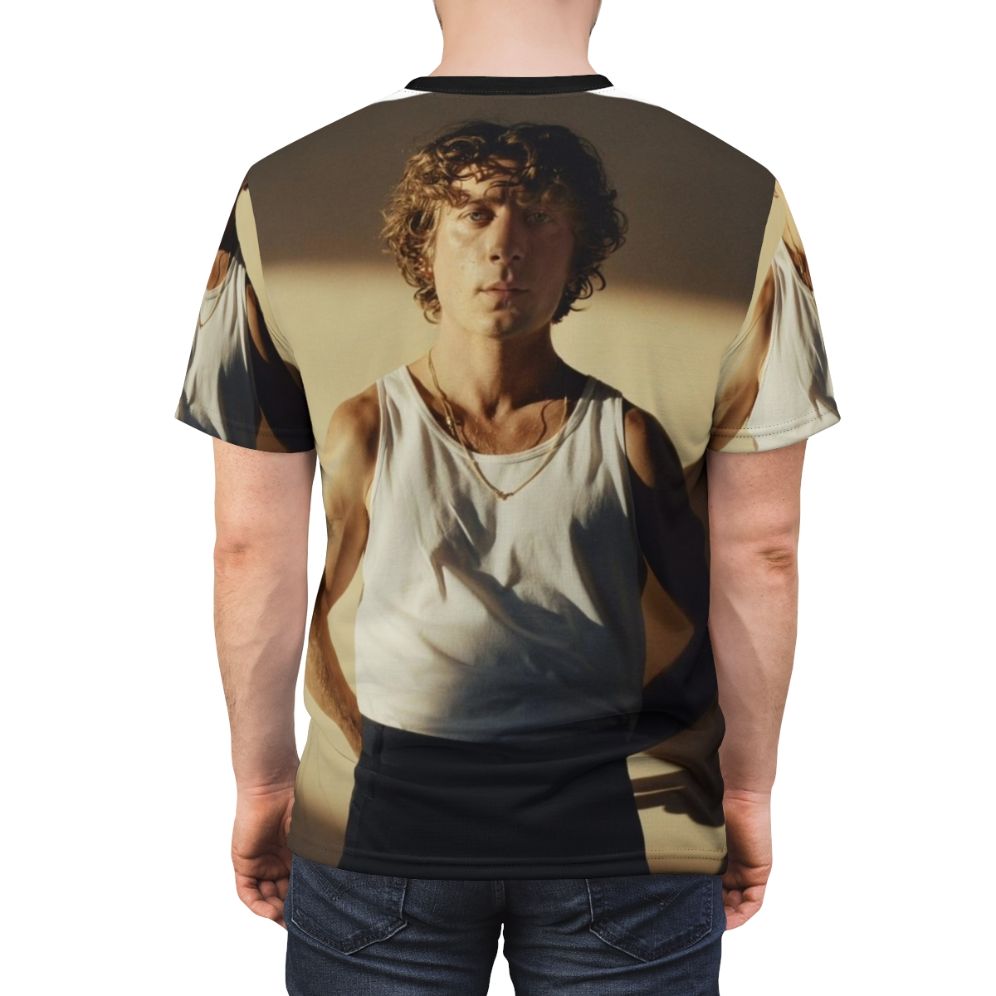 A high-quality t-shirt featuring an illustration of actor Jeremy Allen White, known for his roles in popular movies and TV shows. - men back