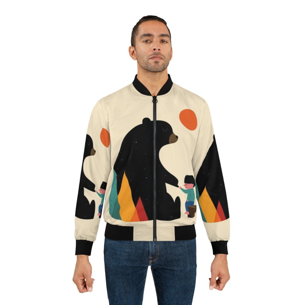 Rugged Promise Bomber Jacket featuring a bear design in a natural landscape - Lifestyle