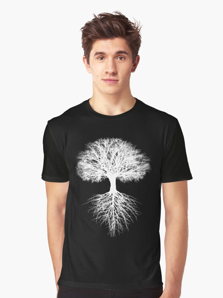 A graphic t-shirt featuring a stylized tree of life design, representing the interconnectedness of nature and the environment. - Men