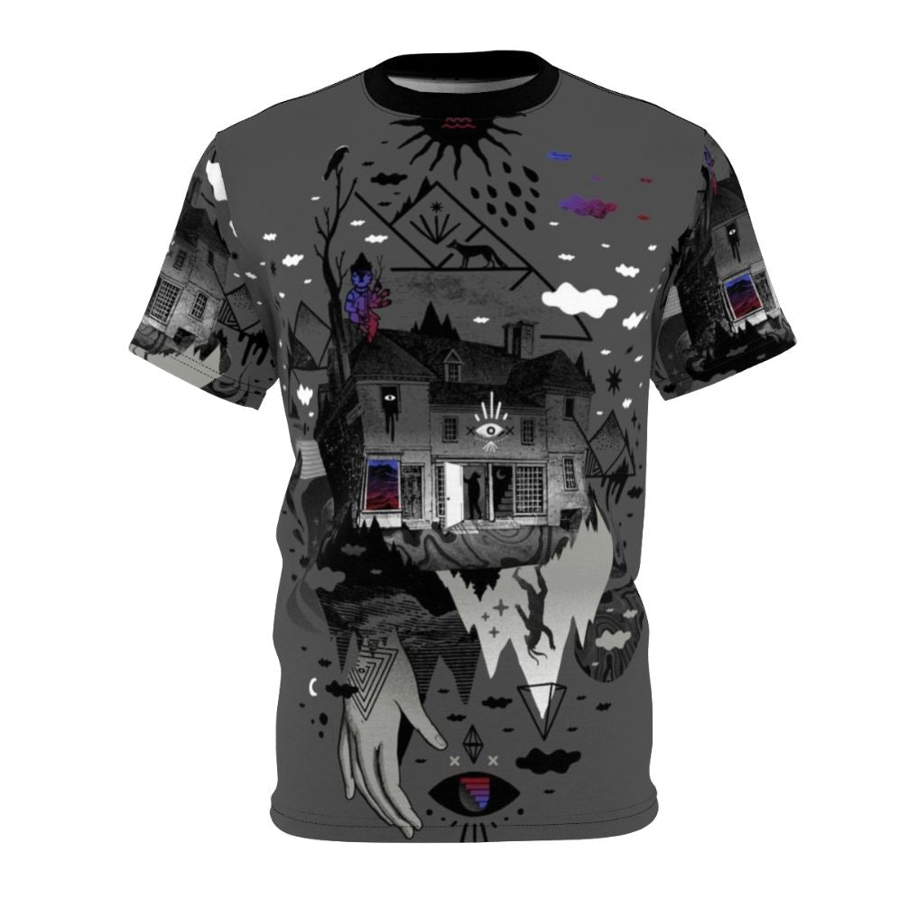 A surreal and abstract t-shirt design featuring a collage of dark mountain shapes, stars, moon, and other symbolic elements.