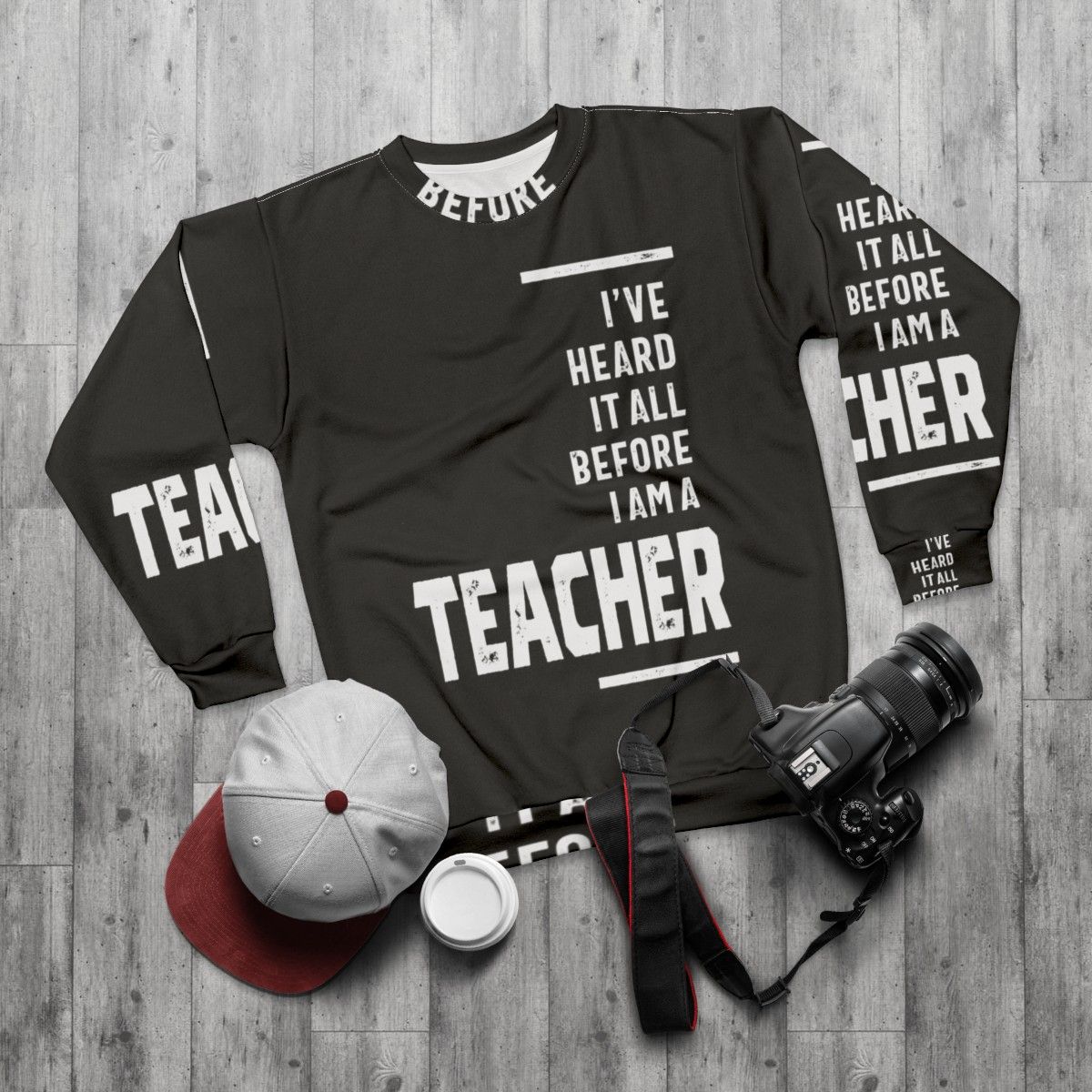 "I've Heard It All" teacher sweatshirt with a funny slogan - flat lay