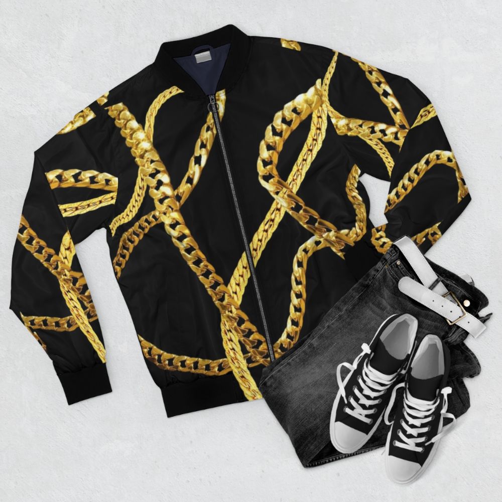 Metallic gold chains bomber jacket, a bold fashion statement - Flat lay