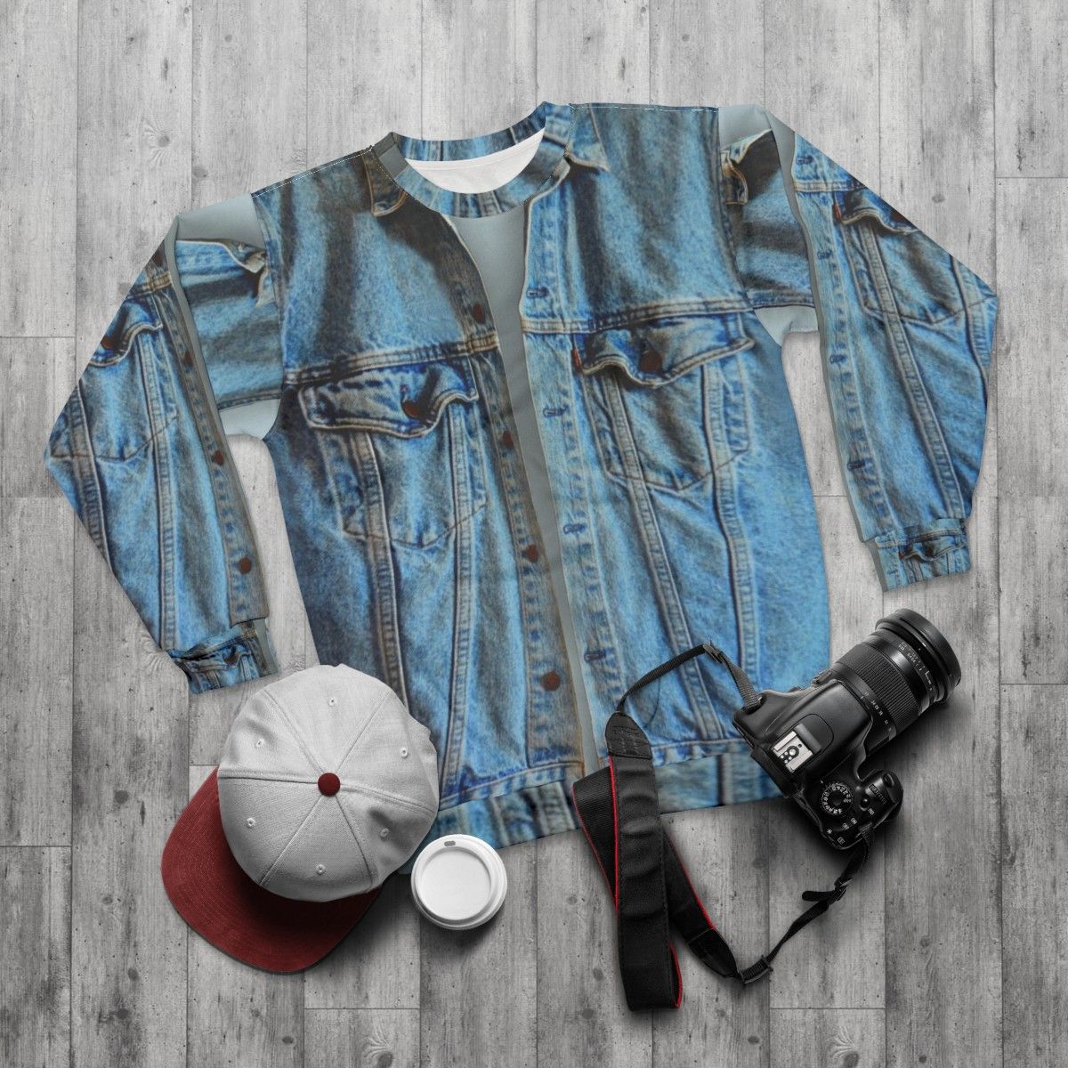 Model wearing a blue denim jacket sweatshirt - flat lay