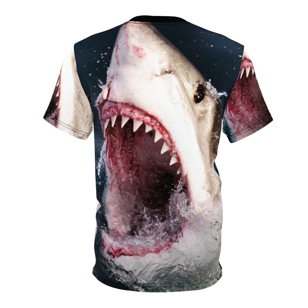 A realistic 3D graphic of a shark taking a bite out of a t-shirt on a solid background. - Back