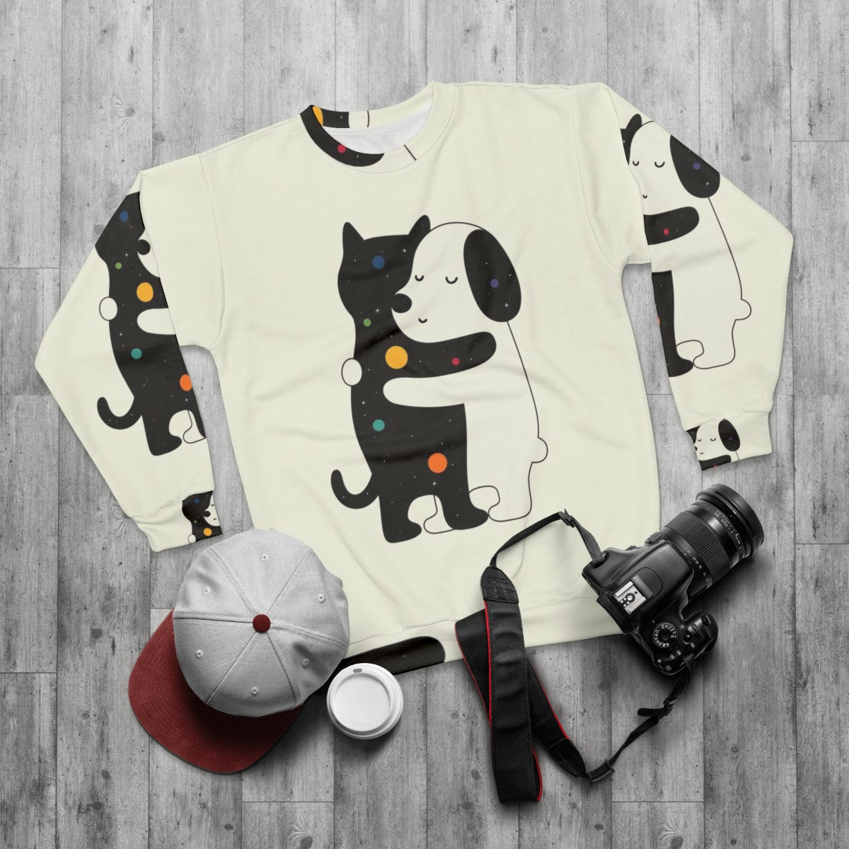 Cozy sweatshirt with colorful universal language design for animal lovers - flat lay