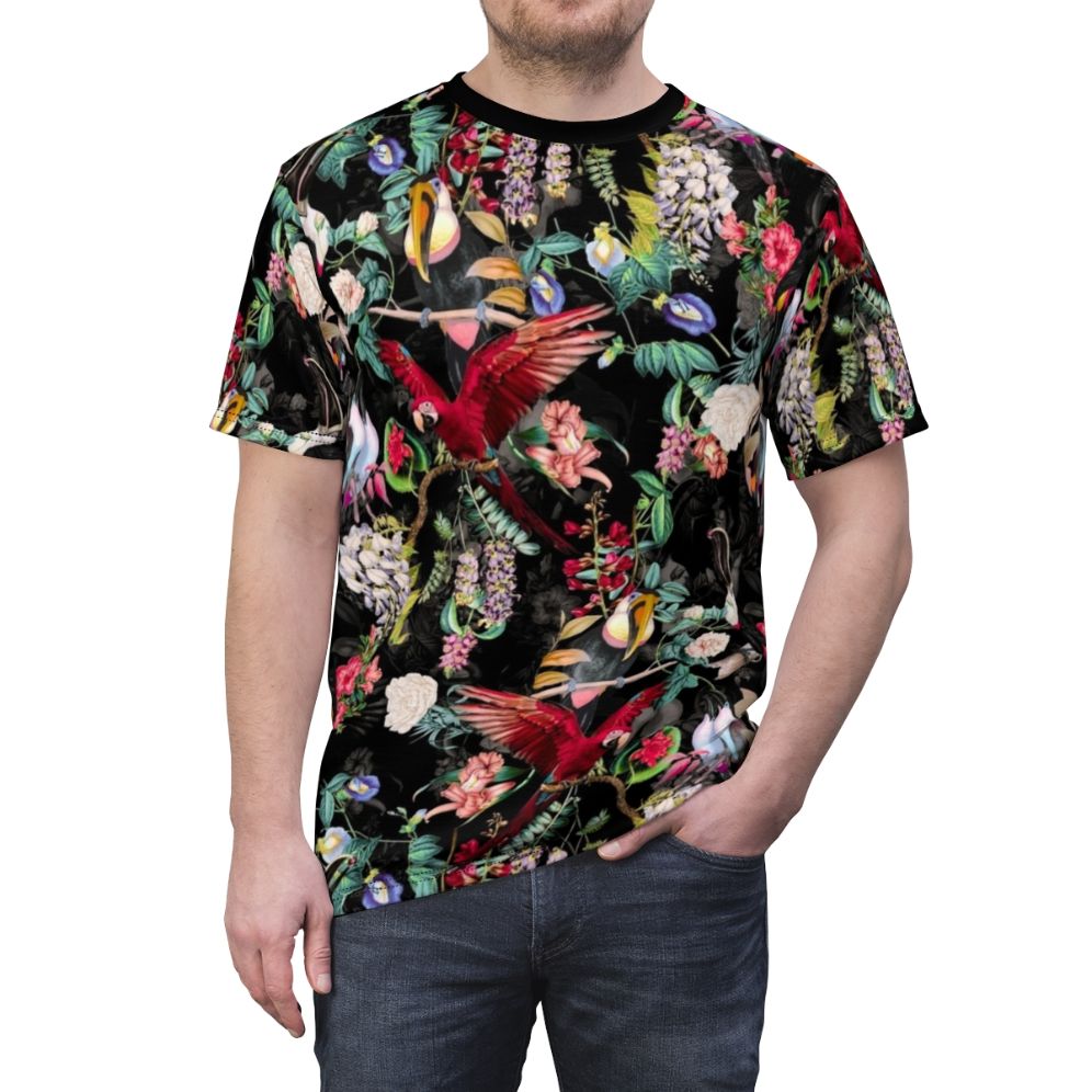 Closeup of a floral and bird print pattern on a t-shirt - men front