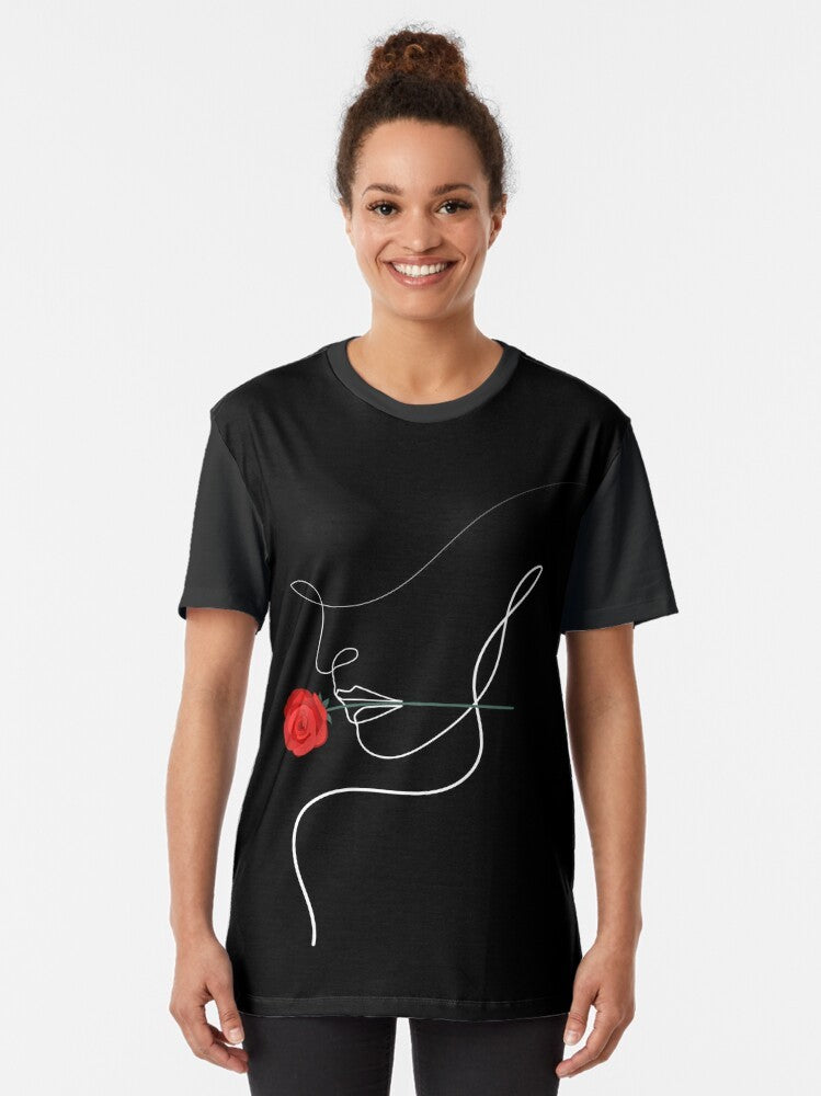 One line art graphic t-shirt featuring a minimalist drawing of a woman with a rose. - Women