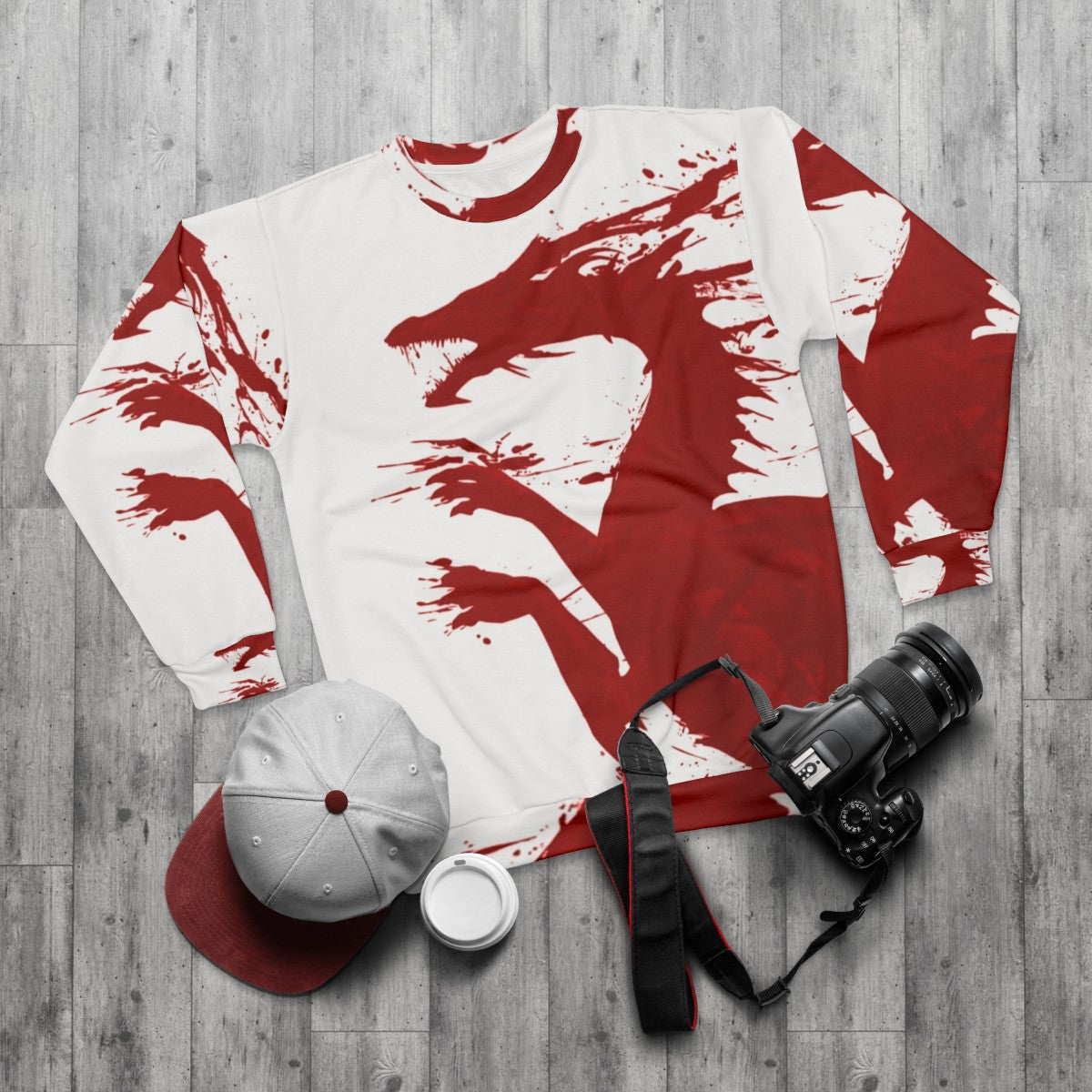 A dragon-themed sweatshirt for gamers and fans of the Dragon Age series - flat lay