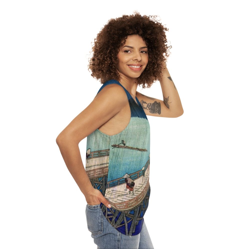 Unisex tank top featuring the Japanese ukiyo-e artwork "Sudden Shower Over Shin Ohashi Bridge" by Hiroshige - women side