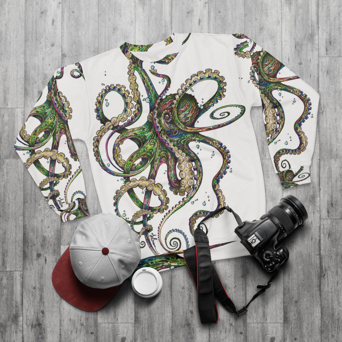 Psychedelic neon octopus design on a sweatshirt - flat lay