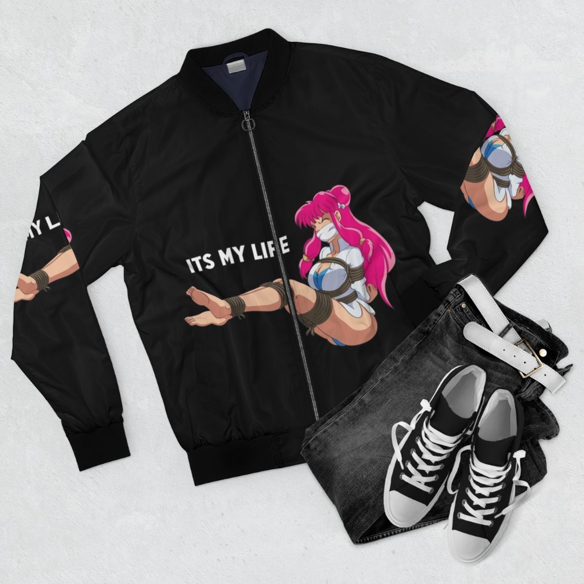 Fashionable bomber jacket with BDSM and manga inspired design - Flat lay