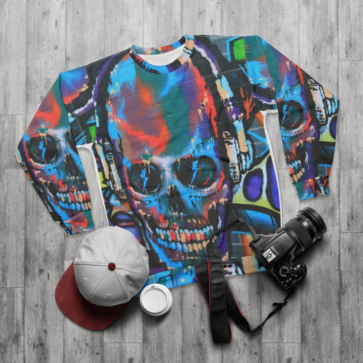 Graffiti sweatshirt featuring vibrant, abstract street art design - flat lay