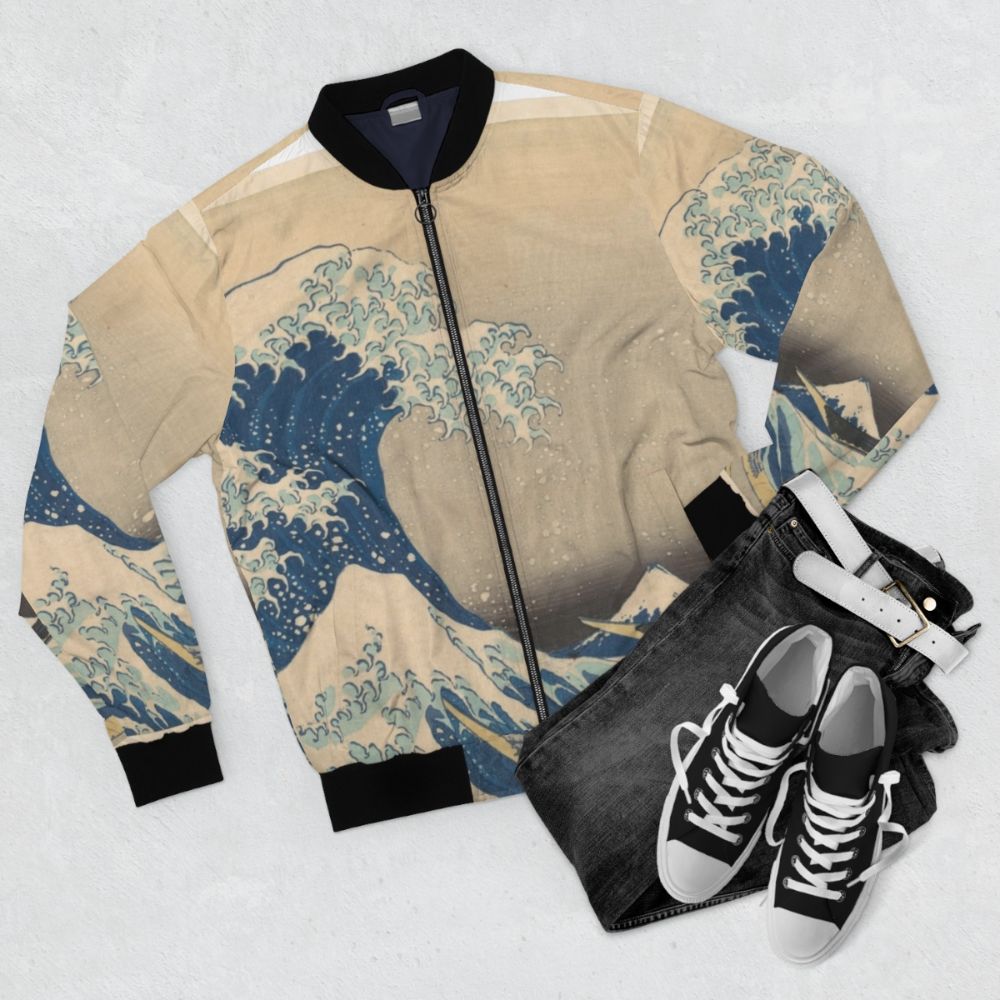 Bomber jacket featuring Katsushika Hokusai's famous woodblock print "The Great Wave off Kanagawa" - Flat lay