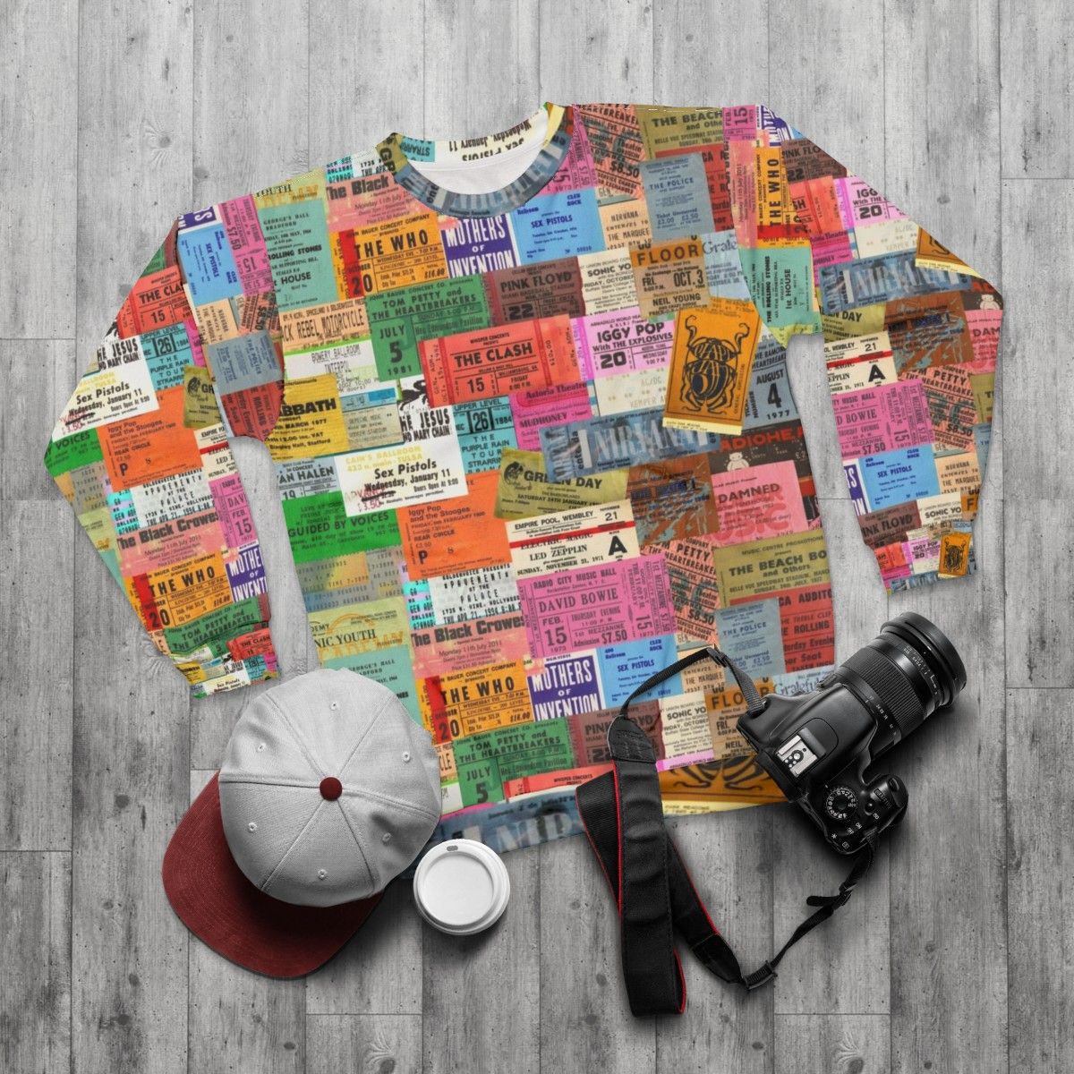 Vintage concert sweatshirt with ticket stubs design - flat lay