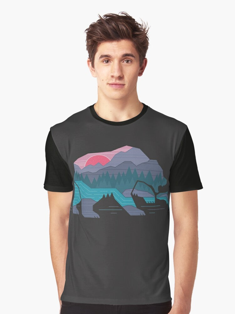 A minimalist graphic t-shirt design featuring a bear in a wilderness landscape with mountains, river, and forest. - Men