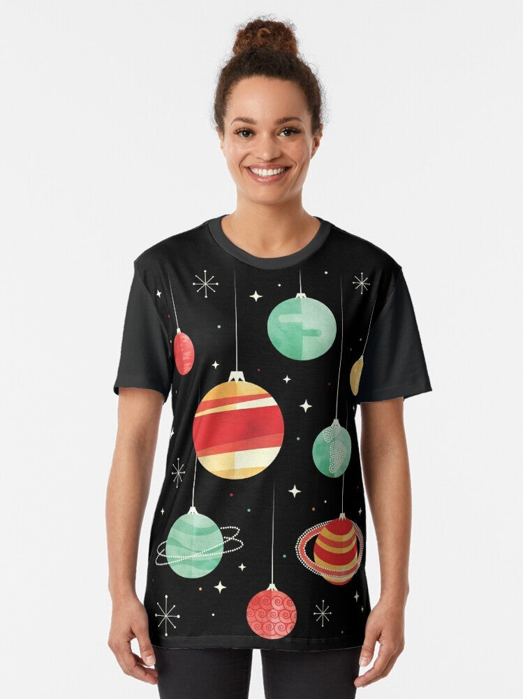 Christmas-themed graphic t-shirt featuring planets, stars, and the universe in a vintage, retro style - Women