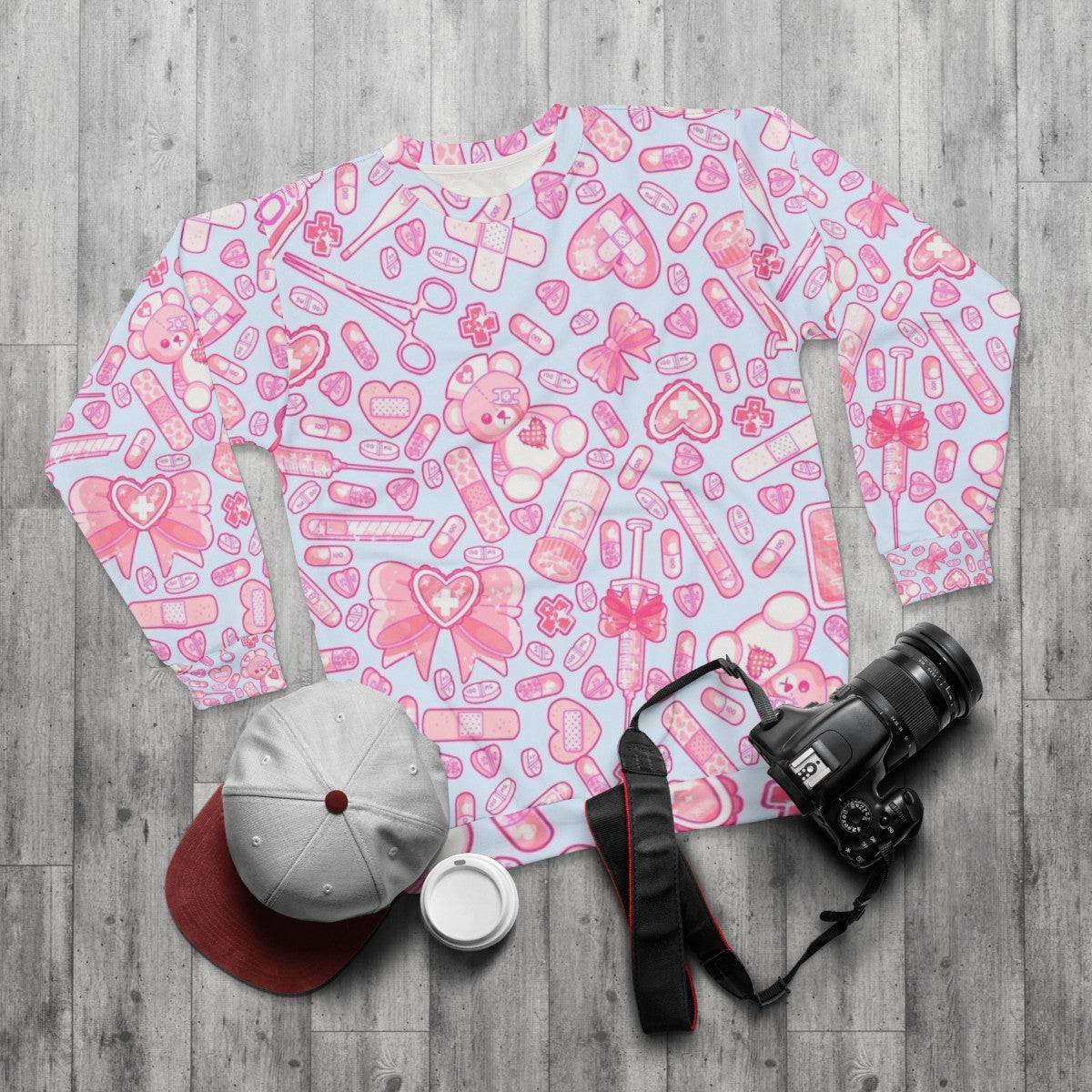 Sickly Sweet Pastel Goth Sweatshirt with Medical Horror Kawaii Vibes - flat lay