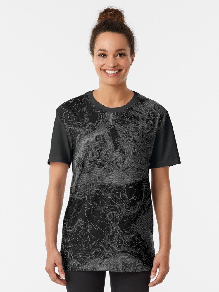 A graphic t-shirt featuring a topographical map design of the North Bend, Washington area. - Women