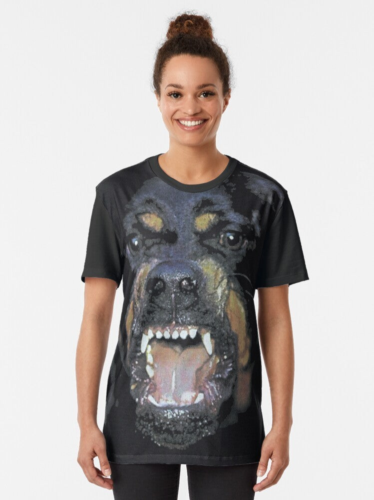 Man wearing a black t-shirt with a large rottweiler graphic design - Women