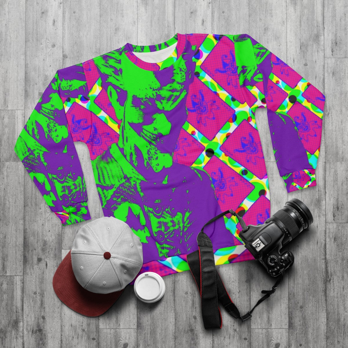 Psychedelic clown prince of crime pop art graphic on sweatshirt - flat lay