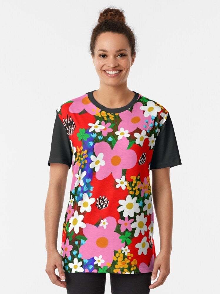 Colorful floral graphic design with flowers, daisies, and 1960s/1970s "flower power" style on a t-shirt. - Women