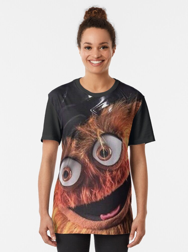 Gritty, the Philadelphia Flyers' new mascot, with a bold, graphic design on a t-shirt. - Women