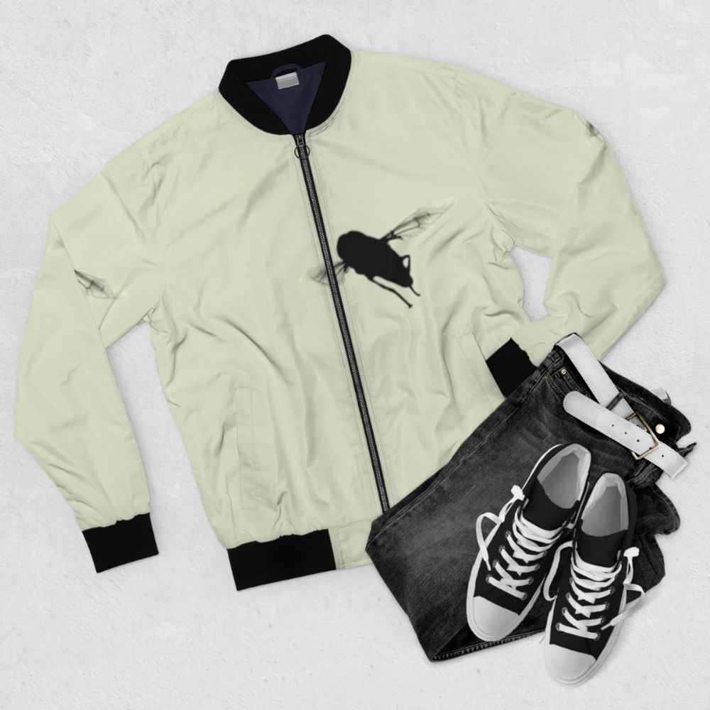 Minimalist bomber jacket with a hover fly silhouette design - Flat lay