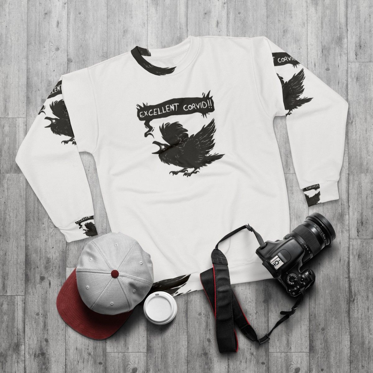 Corvid Sweatshirt - Spooky Bird Graphic - flat lay